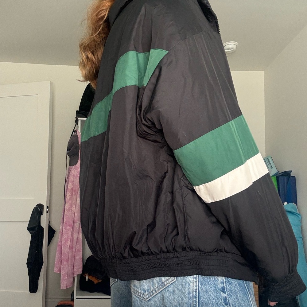 Black Jacket with Green and White Stripes